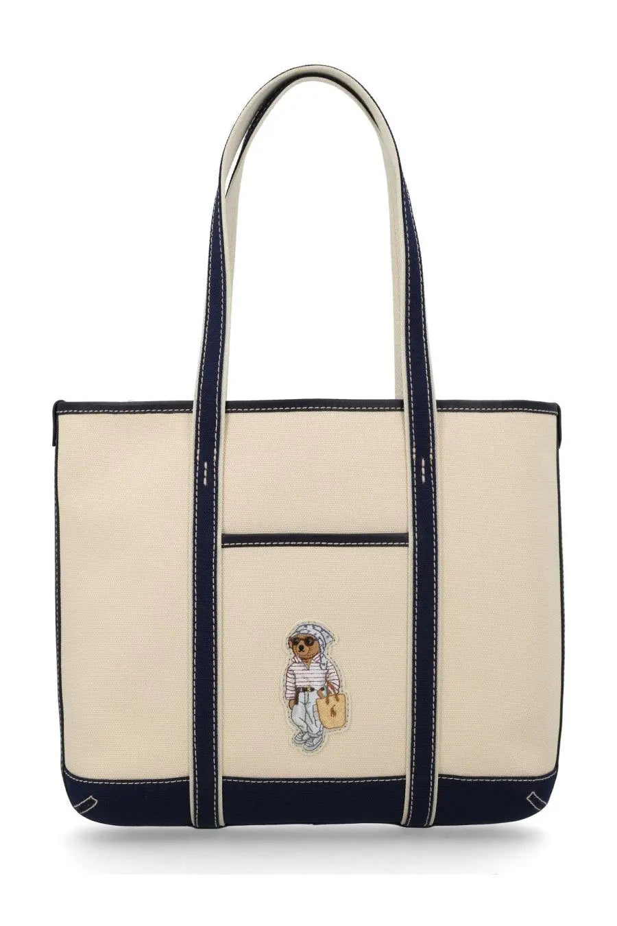Cream-colored canvas tote bag with navy blue trim and bear character embroidery by Polo Ralph Lauren
