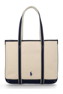 Cream-colored canvas Polo Ralph Lauren women’s Borsa tote bag with navy blue trim handles and embroidered logo