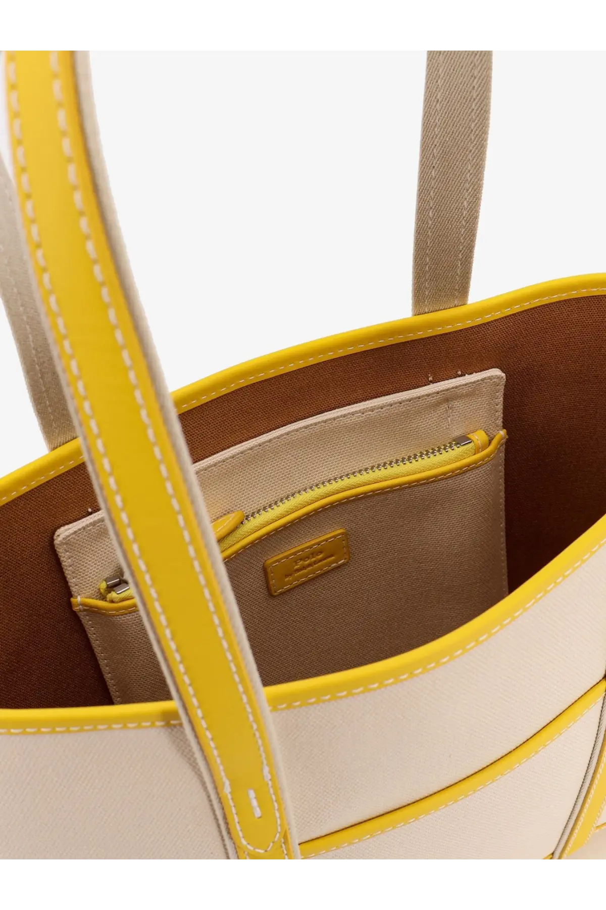 Polo Ralph Lauren women’s canvas shoulder bag in yellow and beige with contrasting stitching and zippered interior pocket