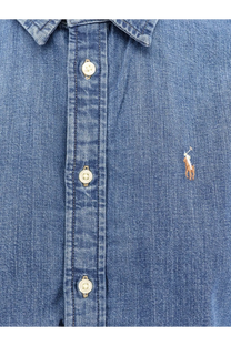 Blue denim button-up shirt with embroidered polo player logo on chest from polo ralph lauren womens mercedwash collection