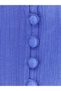 A polo ralph lauren women’s lyocell shirt in blue with textured pleats and matching light blue fabric buttons along the front
