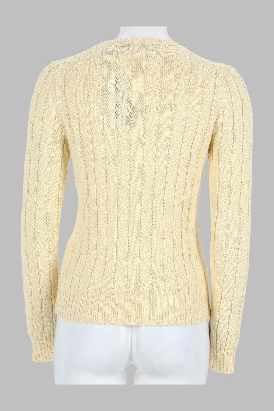 Cream-colored cable-knit sweater with classic round neckline and ribbed cuffs by polo ralph lauren women’s maglia trecce con yellow