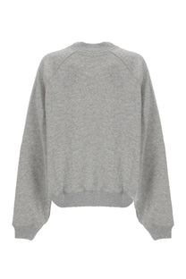 Polo Ralph Lauren women’s soft heather gray sweatshirt with relaxed fit and ribbed cuffs made from comfortable fabric