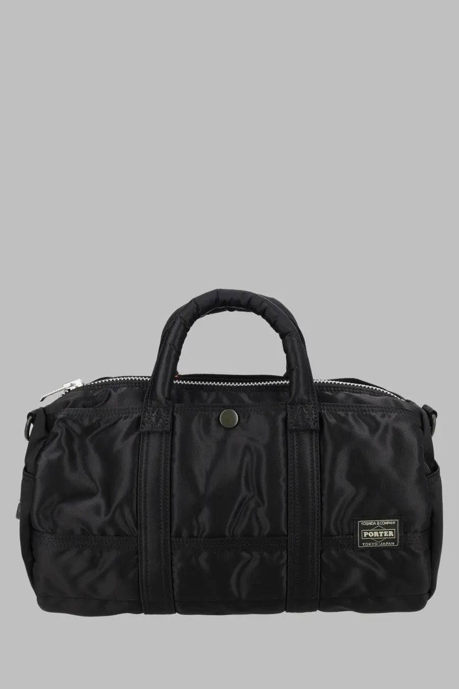 Porter yoshida &amp; co men’s borsa tanker roll black duffel bag with quilted handles and metallic button closure