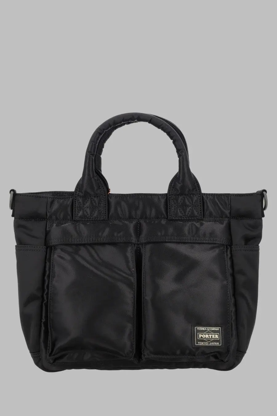 Porter-yoshida &amp; co men’s black porter tote bag with quilted handles and front pockets for versatile use