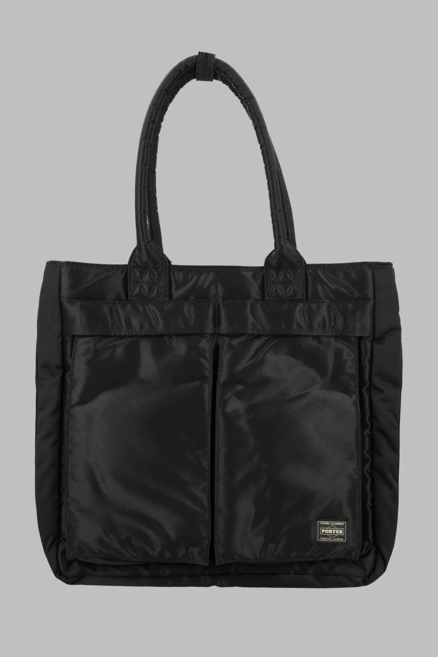 Porter-yoshida &amp; co men’s black porter tote bag with quilted handles and front pockets for daily carrying