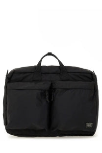 Black porter-yoshida &amp; co men’s briefcase with sleek minimalist design and durable fabric for versatile use