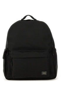 Black porter backpack porter-yoshida &amp; co men’s zaino explorer medium with textured fabric and subtle front branding patch