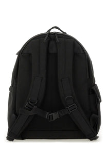 Porter-yoshida &amp; co men’s zaino explorer medium black nylon backpack with adjustable shoulder straps and top handle back view