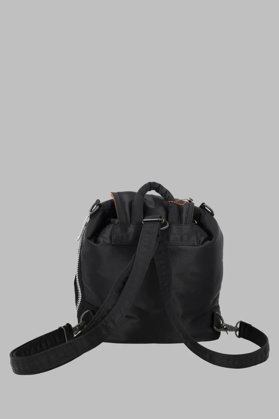 Black nylon Porter-Yoshida &amp; Co men’s Zaino Tanker backpack with adjustable shoulder straps and top handle shown from the back