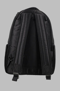 Porter-yoshida &amp; co men’s zaino tanker black nylon backpack with padded shoulder straps and side pockets shown from the back