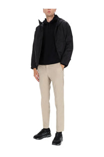 Black puffer jacket with hood and quilted texture by premiata mens hooded jacket black front view