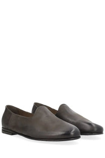 Premiata men’s leather loafer in grey with dark gray smooth slightly worn leather slip-on design and low-profile soles
