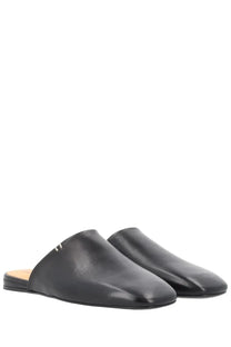 Premiata men’s leather sabot black mules in black leather with sleek minimalist design and subtle side branding