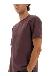 Premiata men’s shirt red is a sleek deep burgundy short-sleeved t-shirt with a simple crew neck and smooth fabric