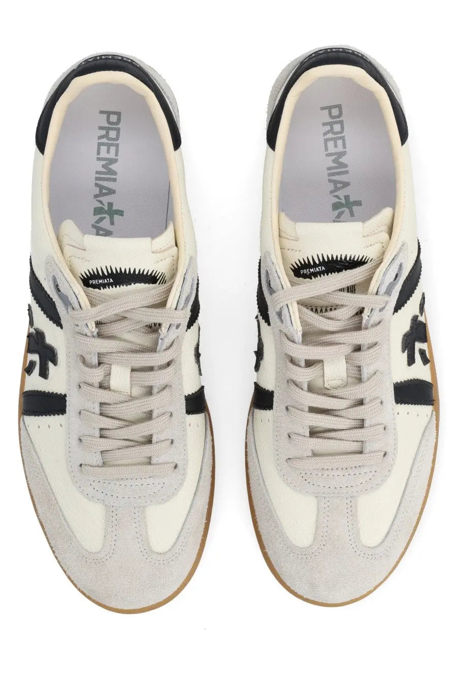 Cream-colored Premiata men’s sneaker Bonnie white made of suede and canvas with black stripes laces and branding