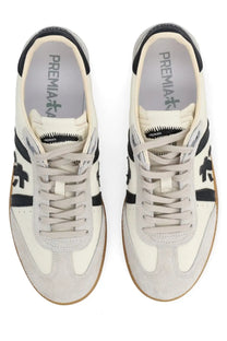 Cream-colored Premiata men’s sneaker Bonnie white made of suede and canvas with black stripes laces and branding