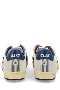 Premiata men’s sneaker bsktclay white suede sneakers in white and blue with gray stripes and navy heel tabs showing bskt and clay branding