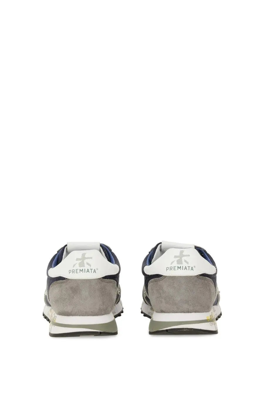 Back view of premiata men’s sneaker lucy blue in navy and gray suede with white rubber soles and premiata logo on heel