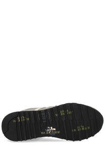 Back view of premiata men’s sneaker lucy grey showing black rubber sole with yellow text and silver heel logo