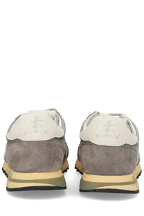 Premiata men’s sneaker lucy grey in gray suede with beige rubber sole and olive green accents front view