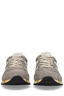 Premiata men’s sneaker lucy grey in gray suede with white stripes and yellow-accented sole for casual wear