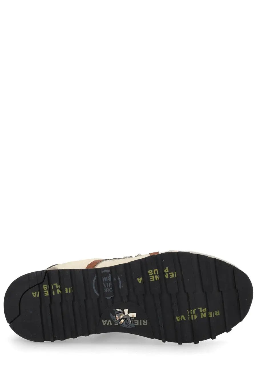 Black rubber sole with yellow rien ne va branding and logo on the back side of premiata mens sneaker lucy white