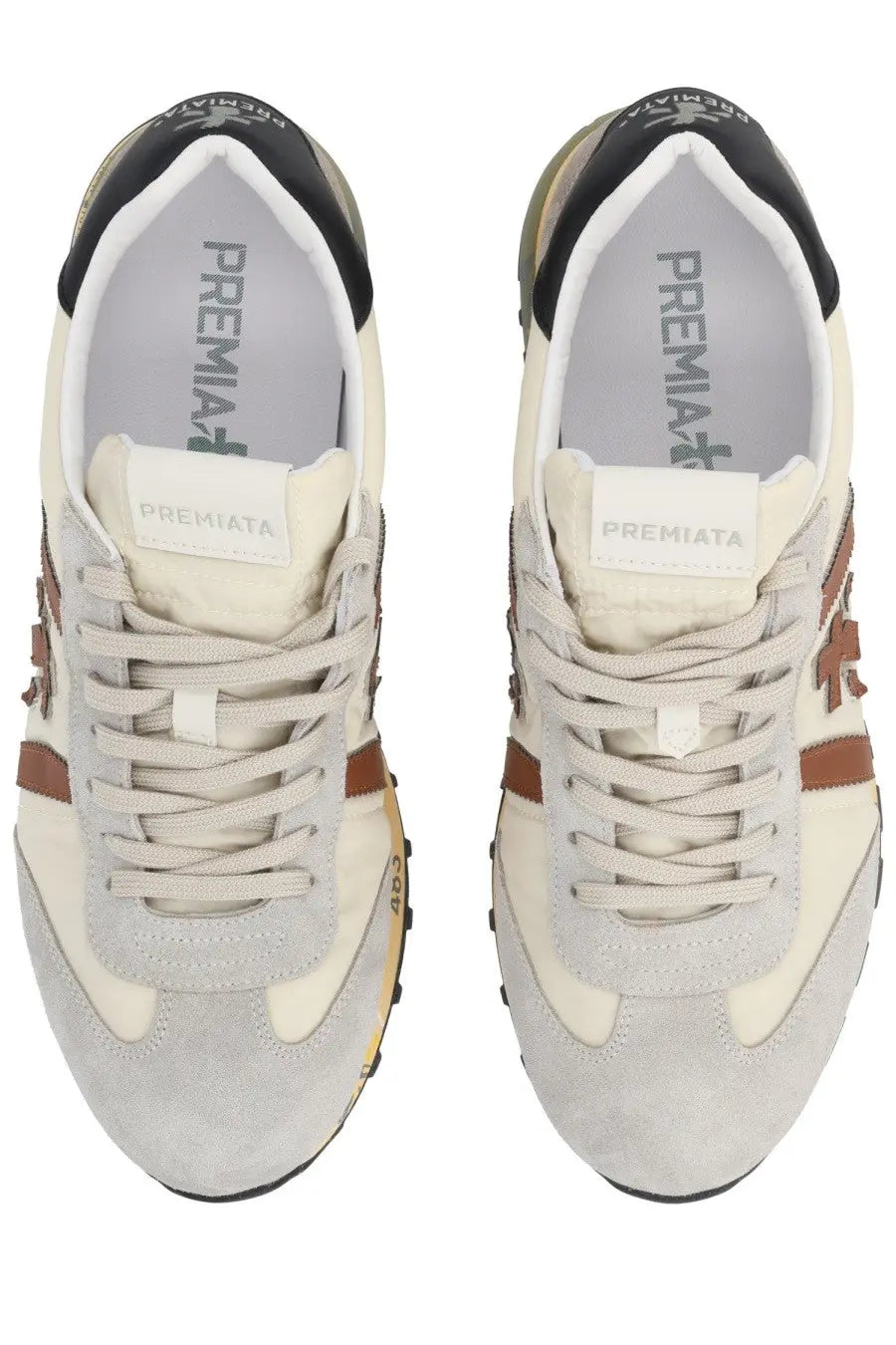Premiata men’s sneaker Lucy white with cream and gray suede and brown leather accents featuring a retro design