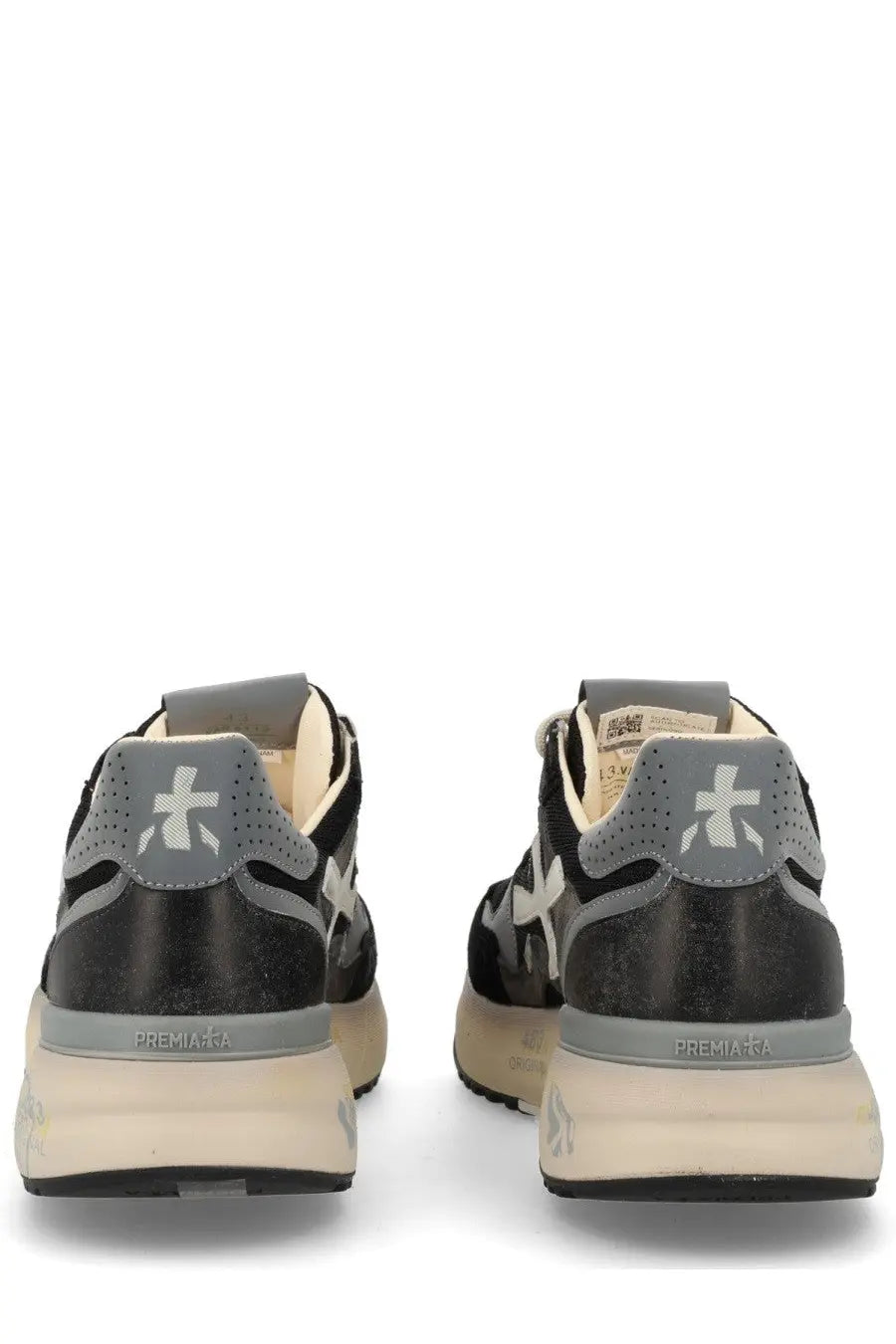 Premiata men’s sneaker Mick black in black and gray with textured upper perforated heel tab and chunky off white sole