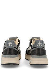 Premiata men’s sneaker Mick black in black and gray with textured upper perforated heel tab and chunky off white sole
