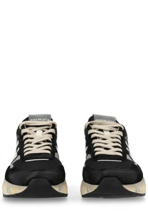 Premiata men’s sneaker mick black in black leather with cream laces and a chunky translucent sole