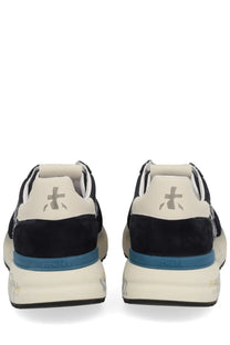 Back view of premia ta men’s sneaker mick blue in black and cream suede with bold blue midsole and premiata logo on heel
