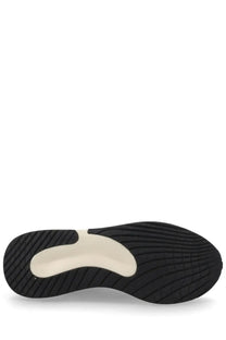 Black rubber sole with cream midsole accent and textured tread on premata men’s sneaker moerun green