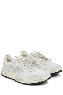 Premiata men’s sneaker nous white with mesh and suede upper silver logo accents and black rubber soles