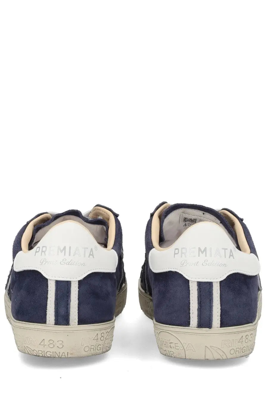 Back view of premia­ta men’s sneaker steven blue navy blue suede with white rubber soles and three vertical heel stripes