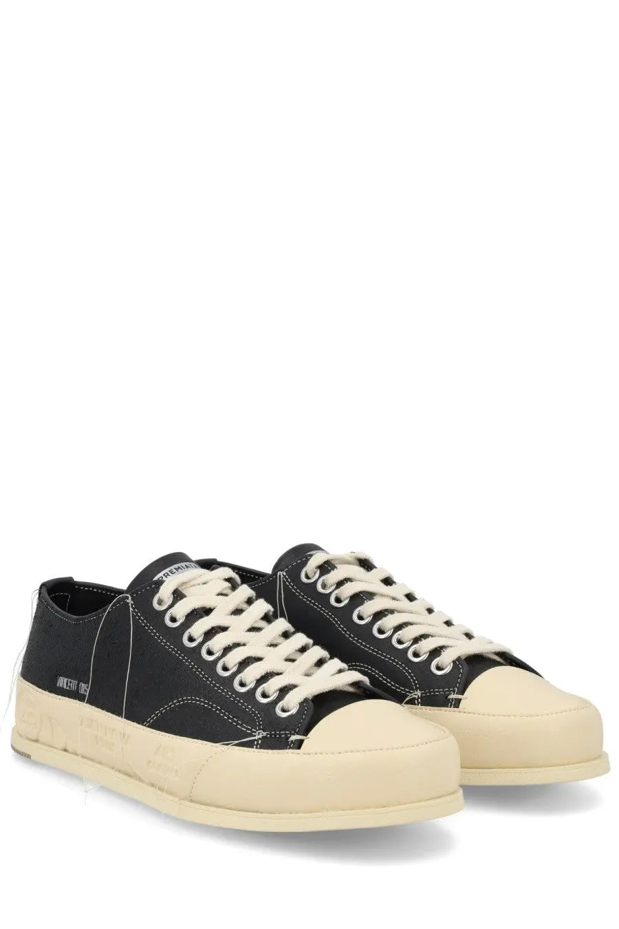 Premiata men’s sneaker Vincent black low-top canvas with cream rubber toe caps laces and chunky off-white sole