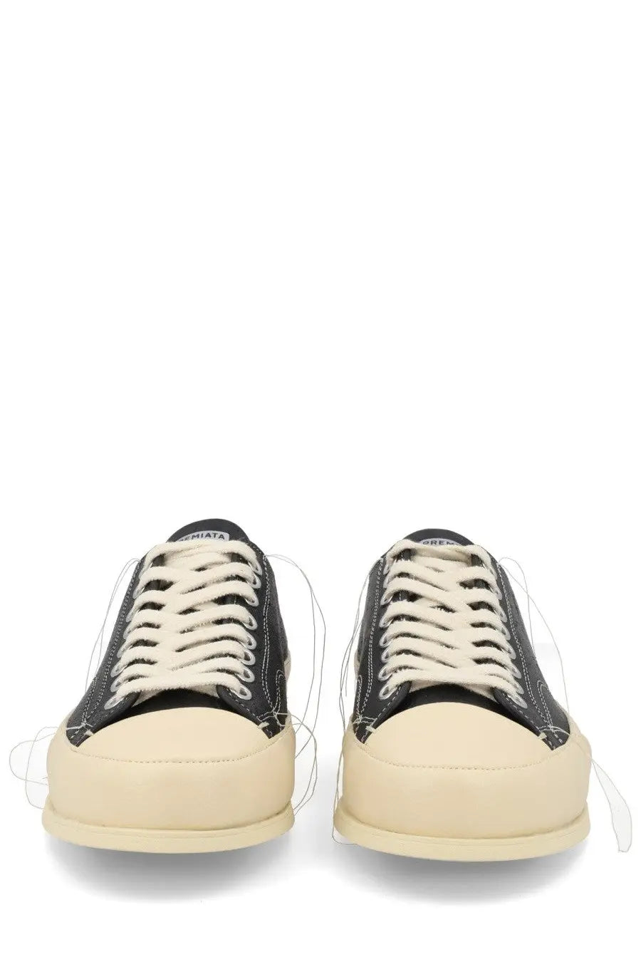 Premiata men’s sneaker Vincent black canvas sneaker with cream rubber soles and laces featuring a minimalist design