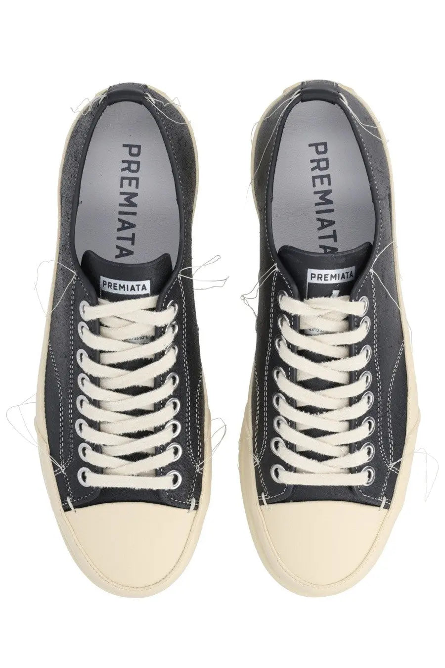 Premiata men’s sneaker vincent black with cream rubber soles and laces featuring a distressed frayed design