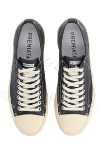 Premiata men’s sneaker vincent black with cream rubber soles and laces featuring a distressed frayed design