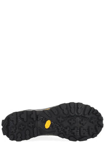 Premiata men’s snerker denvin black shoe with black rubber outsole featuring yellow vibram logo and aggressive tread pattern