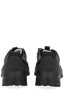 Premiata men’s snerker denvin black rubberized sneakers with chunky sole and textured upper for casual wear