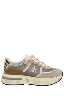 Premiata women’s cassie sneaker in beige and brown suede with white laces gray star logo and thick off-white sole