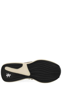 Black and cream-colored textured sole of Premiata women’s Cassie sneaker multicolor designed for athletic use