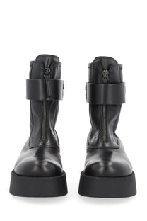 Premiata women’s black leather ankle boots with thick platform sole and wide strap across the upper