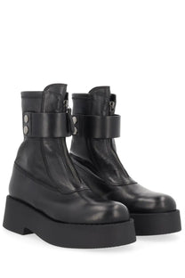 Premiata women’s black leather platform boots with thick sole and adjustable strap detail