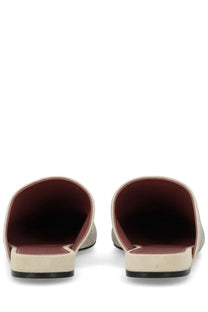 Premiata women’s leather beige slippers with cream suede mules featuring subtle glittery texture and burgundy lining