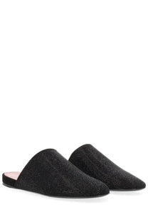 Premiata women’s leather slip-on mules in black with a sparkling textured upper and sleek flat sole
