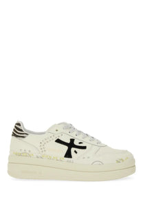 Premiata women’s Micol white sneaker with black logo, zebra-striped heel tab, and silver studs along the side