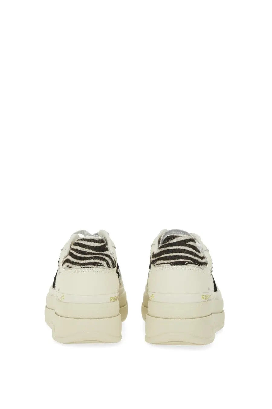Back view of Premiata womens Micol cream platform sneakers with black and white zebra striped heel tab