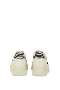 Back view of Premiata womens Micol cream platform sneakers with black and white zebra striped heel tab